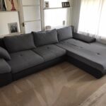 This is a photo of a grey L shape sofa that has been professionally steam cleaned, also the beige carpets have been steam cleaned too works carried out by Chessington Carpet Cleaning